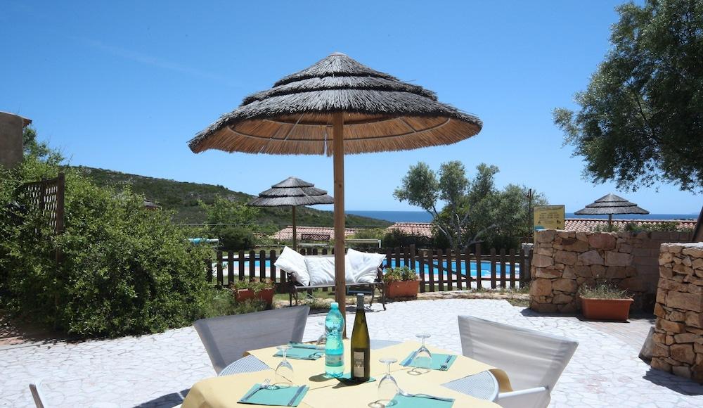Residence Baia Salinedda Capo Coda Cavallo Esterno foto